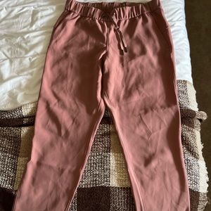 Mauve Lululemon On the Fly 7/8 Pants